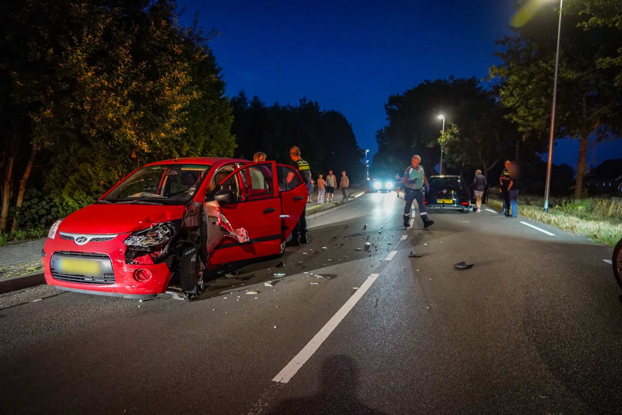 Forse schade na botsing tussen twee voertuigen in Emmer-Compascuum